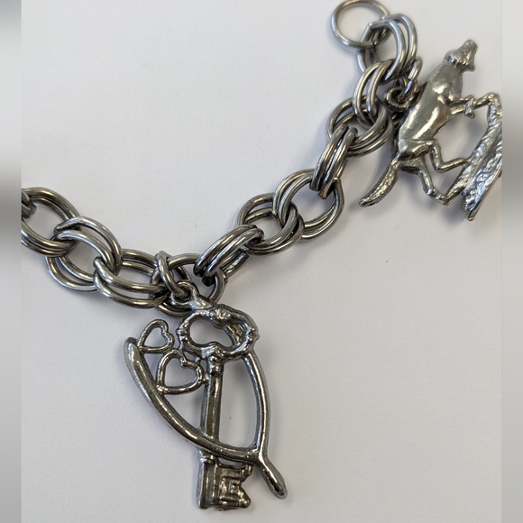 EVC SILVER TONE CHARM BRACELET - Picture 5 of 14